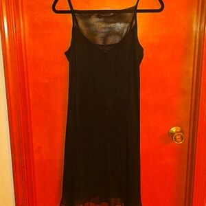 **Chic Black Slip Dress with Sheer Detail**